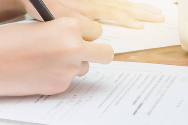 istock kids doing homework together at home 952995040