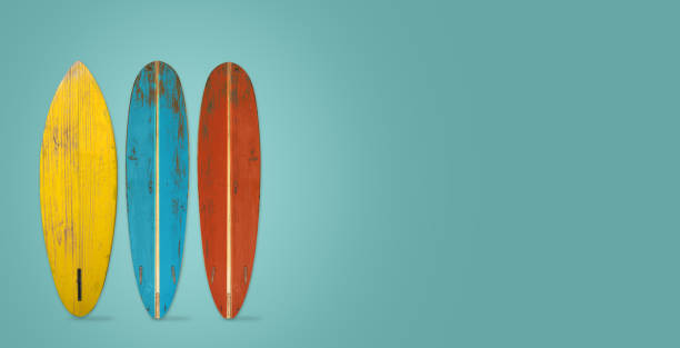 istock Vintage surfboard on color background. 952995700