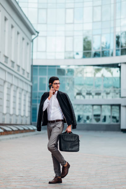 istock business communication man phone busy lifestyle 953001444