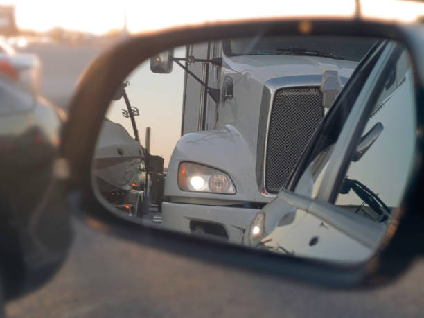 istock Car in traffic looking in side mirror 953002156