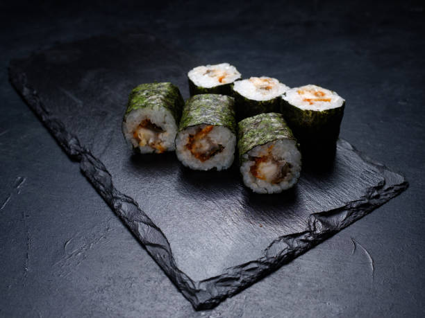 istock sushi salmon rolls japanese food preparing craft 953002214