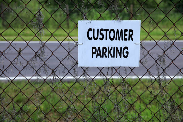istock close up customer parking sign on fence 953005328
