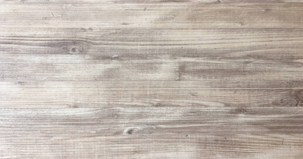 wood texture background, light oak of weathered distressed rustic wooden with faded varnish paint showing woodgrain texture. hardwood planks pattern table top view. - rústico imagens e fotografias de stock