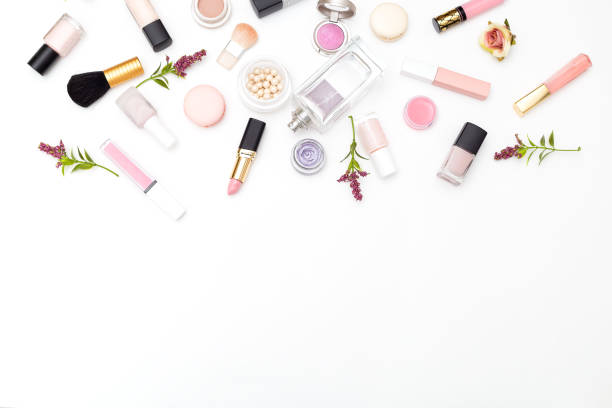 istock Make up products and flowers on white background. Copy space 953014594