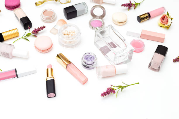 istock Make up products and flowers on white background. Beauty 953014618