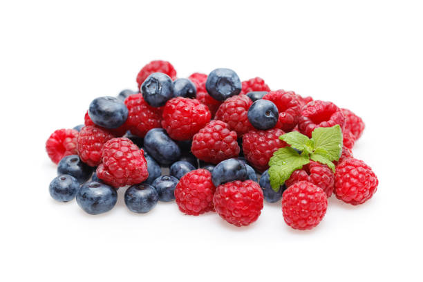 istock blueberry and raspberry berries isolated on white background 953027932