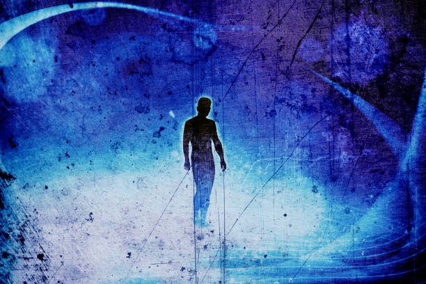 conceptual grunge style image of abstract light manipulation and silhouetted man