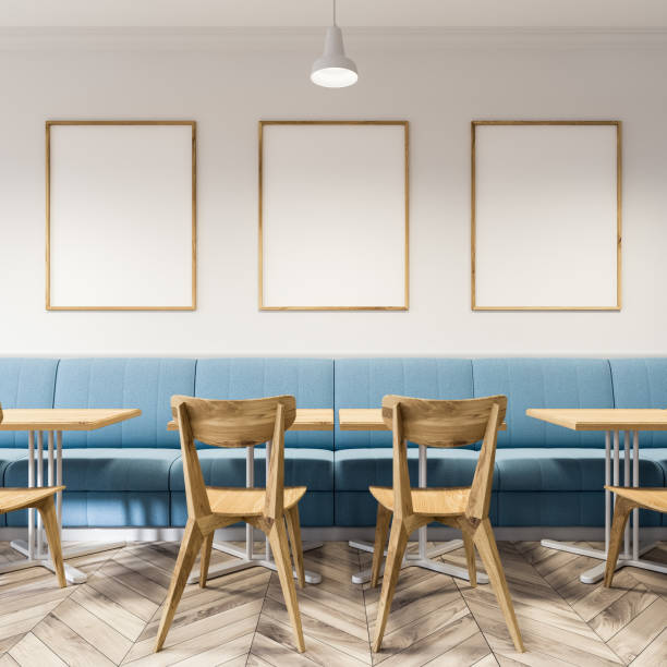 istock White cafe, wooden chairs, poster gallery 953031396