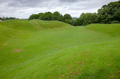 Earthwork remains of the Roman amphitheatre, one of the largest Roman amphitheatres in Britain. Cirencester, Gloucestershire, South West England, UK