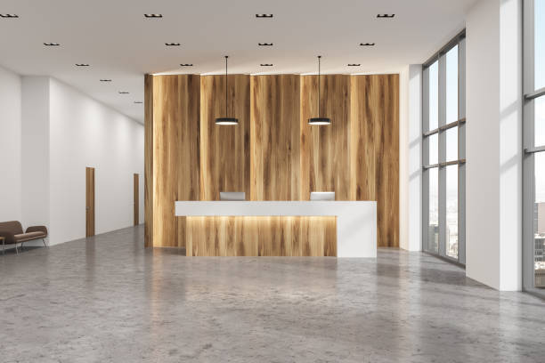 istock Wooden and white reception office lobby 953036050