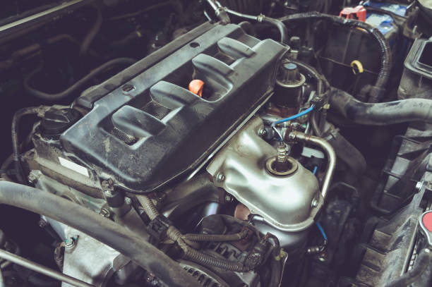 istock Closeup details of automobile engine. Vintage film filter effect. 953036358
