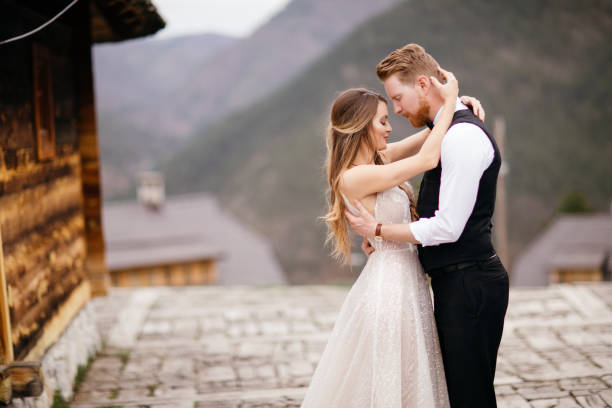istock Wedding couple embracing outdoors 953040700