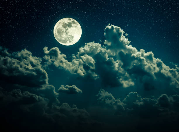 istock Night sky with bright full moon and cloudy, serenity nature background. 953041002