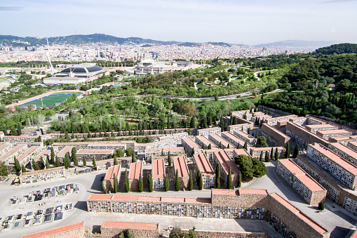Barcelona cityscape with Montjuic Cemetery in foreground. Aerial view seen from Montjuic hill.