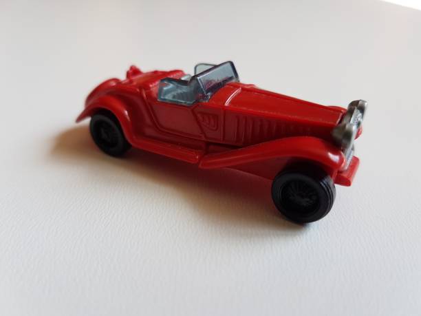 istock red retro plastic car isolated toy 953052652