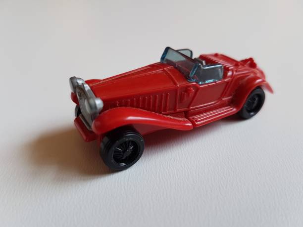 istock red retro plastic car isolated toy 953052654