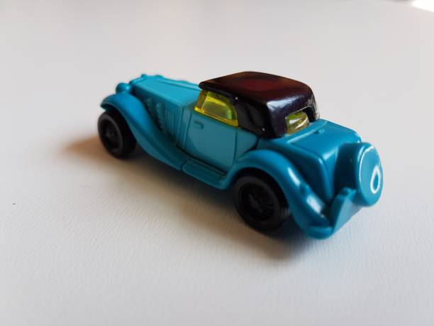 istock blue retro plastic car isolated toy 953052692