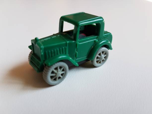 istock retro plastic green car isolated toy 953052702