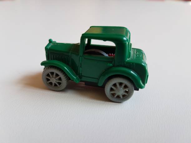 istock retro plastic green car isolated toy 953052708