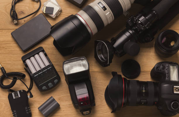diverse personal equipment for photographer - office tool flash imagens e fotografias de stock
