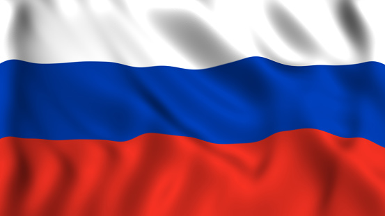 Seda de la bandera rusa ondeando en el cielo photo