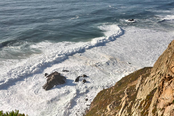 istock Exploring Portugal. Cabo da Roca ocean and mountains view landscape, authentic capture, wanderlust concept. 953069296