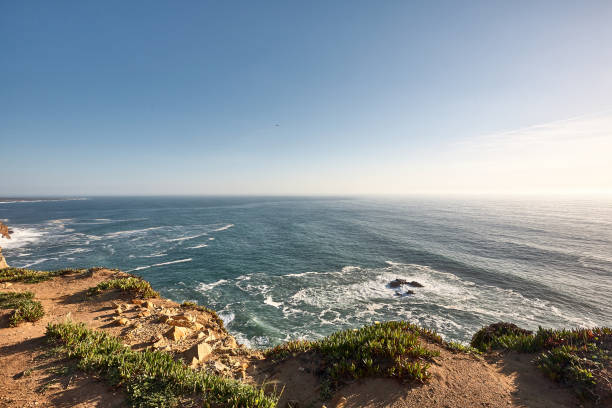 istock Exploring Portugal. Cabo da Roca ocean and mountains view landscape, authentic capture, wanderlust concept. 953069332