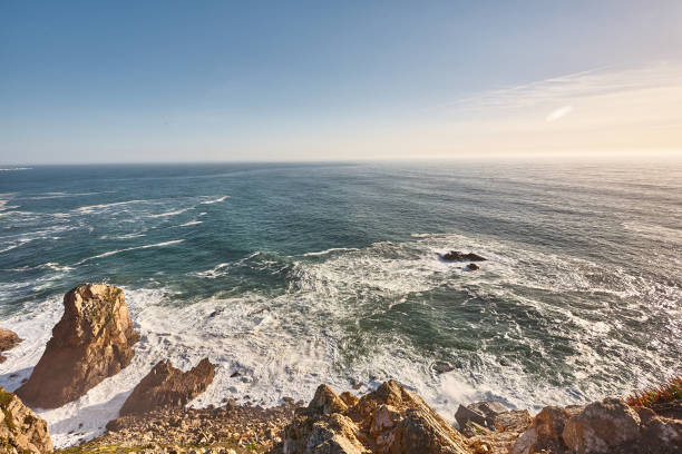 istock Exploring Portugal. Cabo da Roca ocean and mountains view landscape, authentic capture, wanderlust concept. 953069374