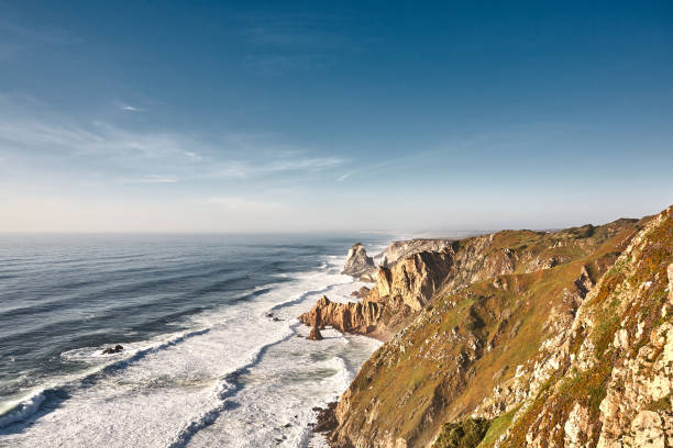 istock Exploring Portugal. Cabo da Roca ocean and mountains view landscape, authentic capture, wanderlust concept. 953069538