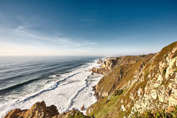 istock Exploring Portugal. Cabo da Roca ocean and mountains view landscape, authentic capture, wanderlust concept. 953069546