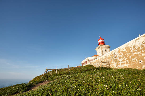 istock Exploring Portugal. Cabo da Roca ocean and mountains view landscape, authentic capture, wanderlust concept. 953069600