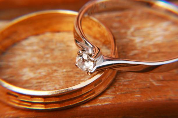 istock Gold rings with coins 953070680
