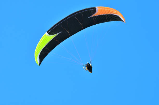 istock Para-glider in sunny day flying in Puli, Taiwan 953073596