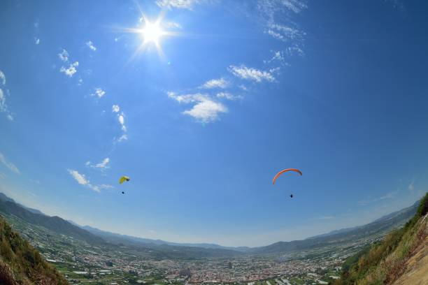 istock Para-glider in sunny day flying in Puli, Taiwan 953073766
