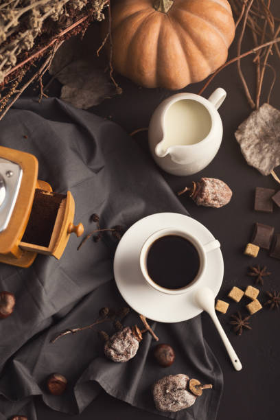 istock Coffee cup and sweets on vintage wooden table 953078654