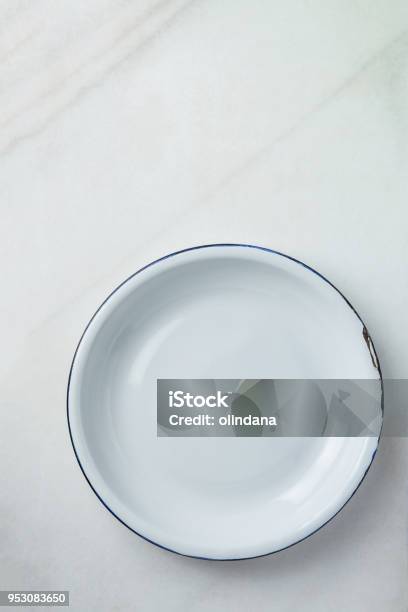 White Vintage Enamel Plate With Blue Edges On Marble Stone Background Minimalist Style Template For Poster Banner Cooking Baking Workshop Course Easter Christmas Concept Stock Photo - Download Image Now