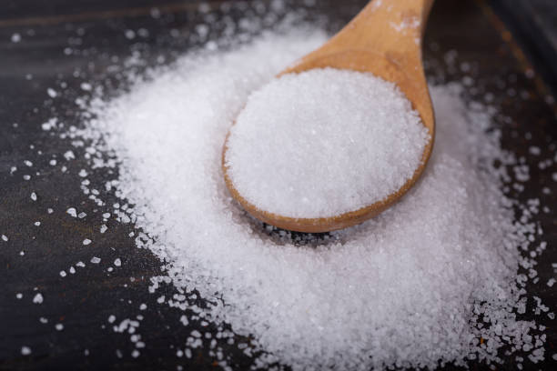 istock sea salt in a wooden spoon 953087892
