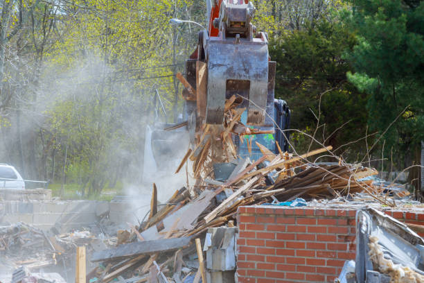 istock Excavator Demolition of an old house building for new construction project. 953090982