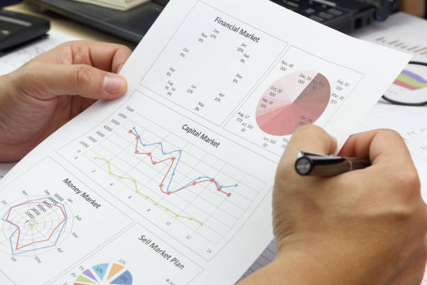 istock Businessman Summary report and analyzing capital market plan 953091622
