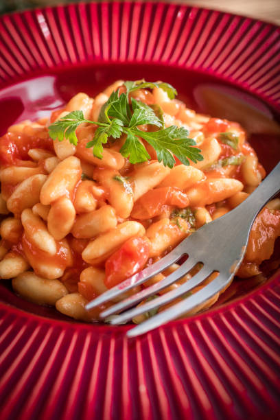 istock Cavatelli pasta with fresh tomato sauce. 953092146