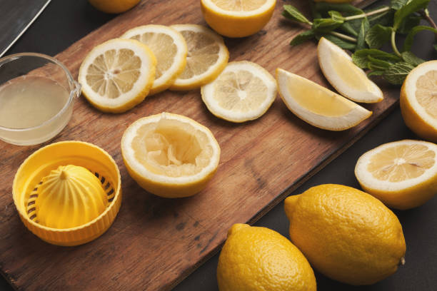 istock Making lemonade at home, ingredients on white wooden table 953095676