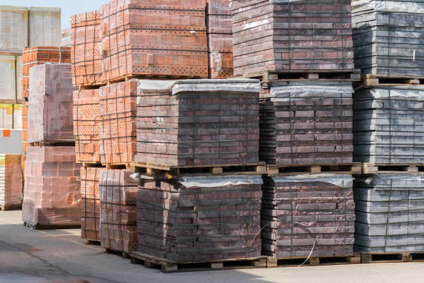 istock pallets with bricks in the building store. Racks with brick. Masonry, stonework. 953096766