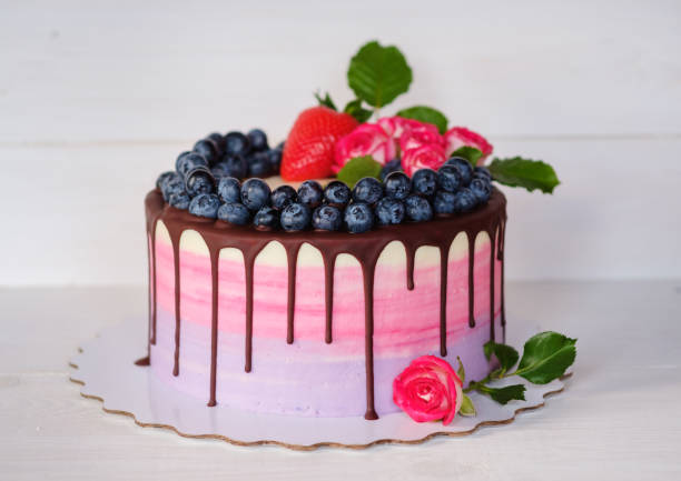 istock beautiful homemade birthday cake with live roses 953100856