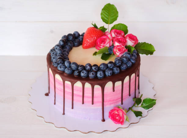 istock beautiful homemade birthday cake with live roses 953100862