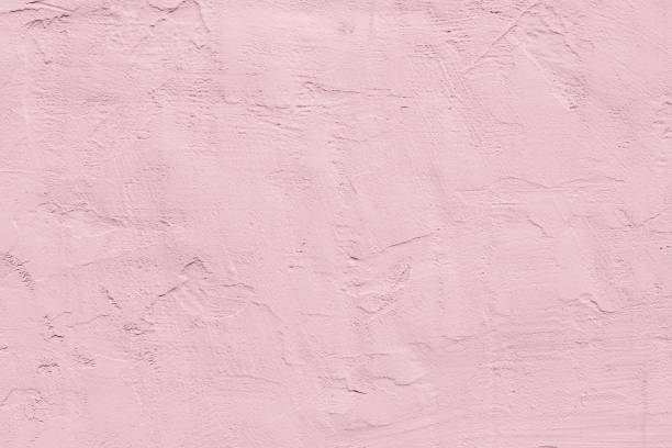 pale pink rough textured concrete background