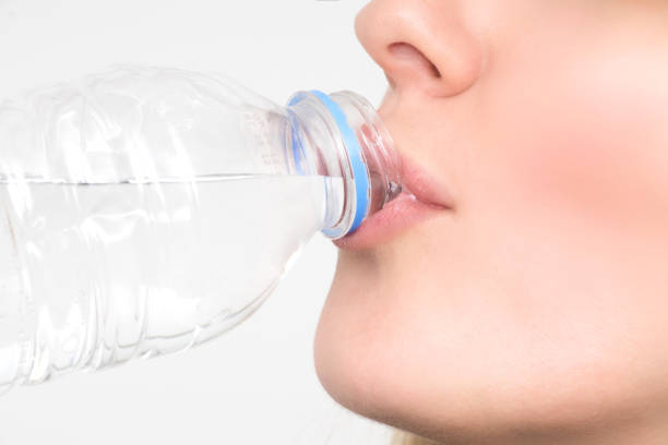 istock Woman drinks water from the bottle 953101430