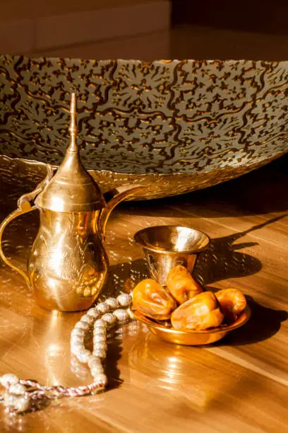 Arabic coffee is one of special drinks in Arabic culture, rosary beads and date-fruit.