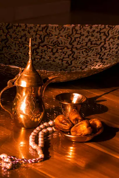 Arabic coffee is one of special drinks in Arabic culture, rosary beads and date-fruit.