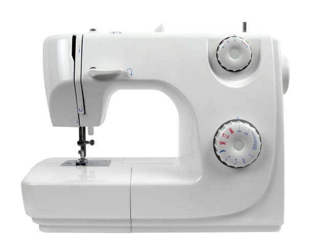 istock Close-Up Of Sewing Machine On White Background 953135818