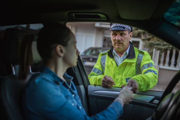 istock Police officer writing speeding ticket 953136136